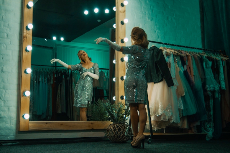 Actress looking at herself in a mirror